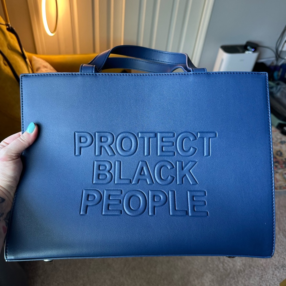 Blue Tote Bag with Embossed Message - like new. Bought during Covid/BLM